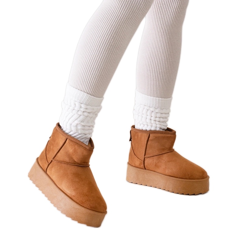 Brown casual snow boots with a high platform from Thaisa