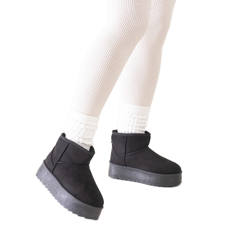 Black casual snow boots with a high platform from Thaisa