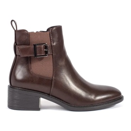 Women's brown Chelsea boots with a buckle and high heels
