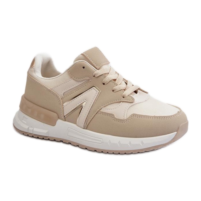 Sports Shoes On A Delicate Beige Platform