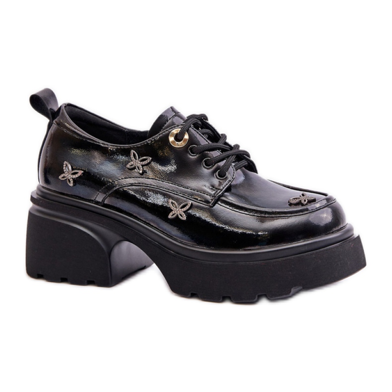 Women's shoes decorated with Black Lacquer details Women's shoes decorated with Black Lacquer details