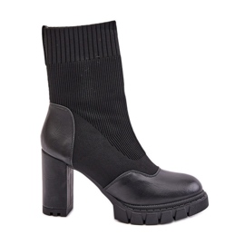 Black Atansa ankle boots with a sock