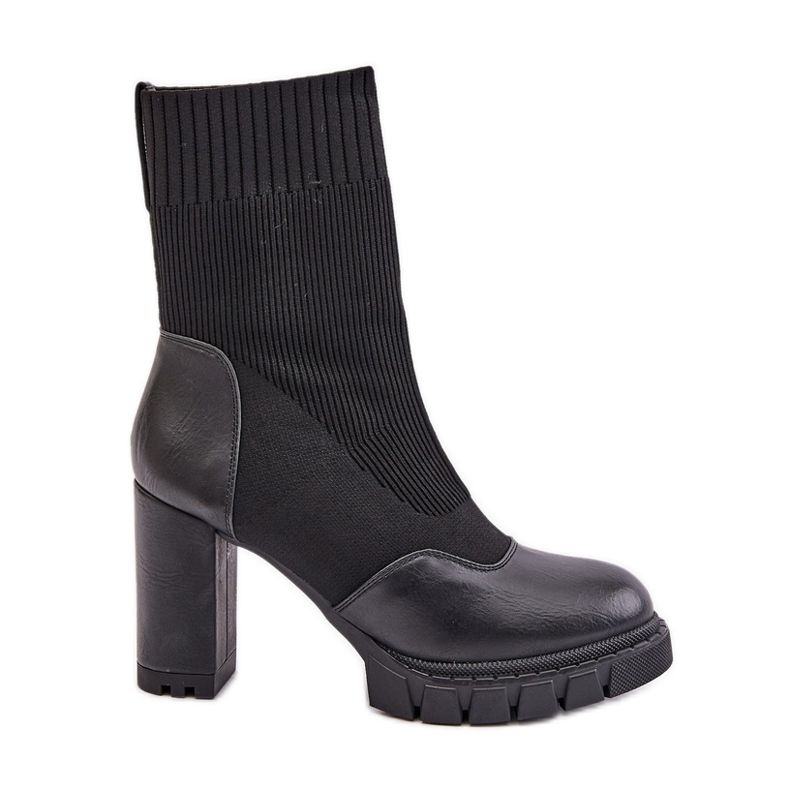 Black Atansa ankle boots with a sock