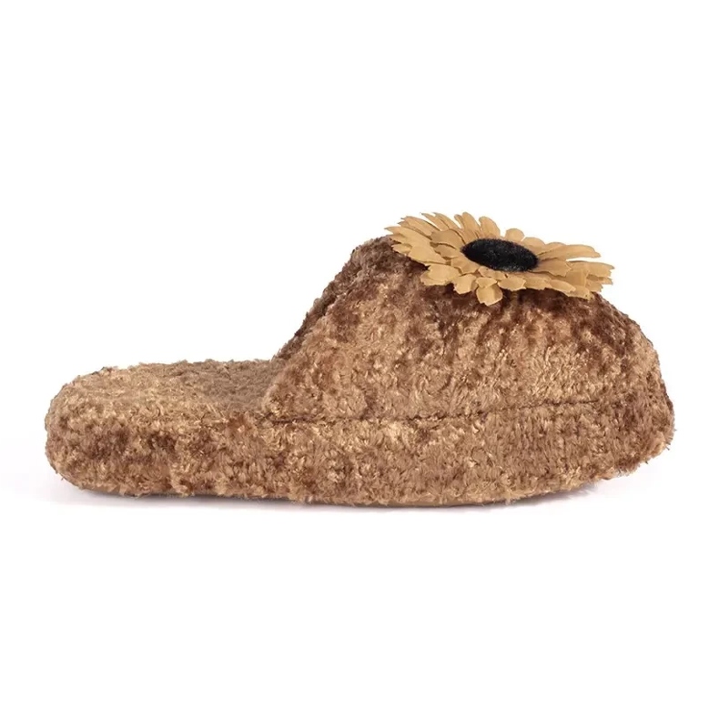 Brown children's slippers with a decorative flower