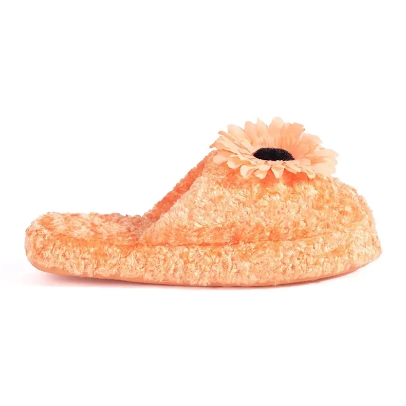 Orange children's slippers with a decorative flower