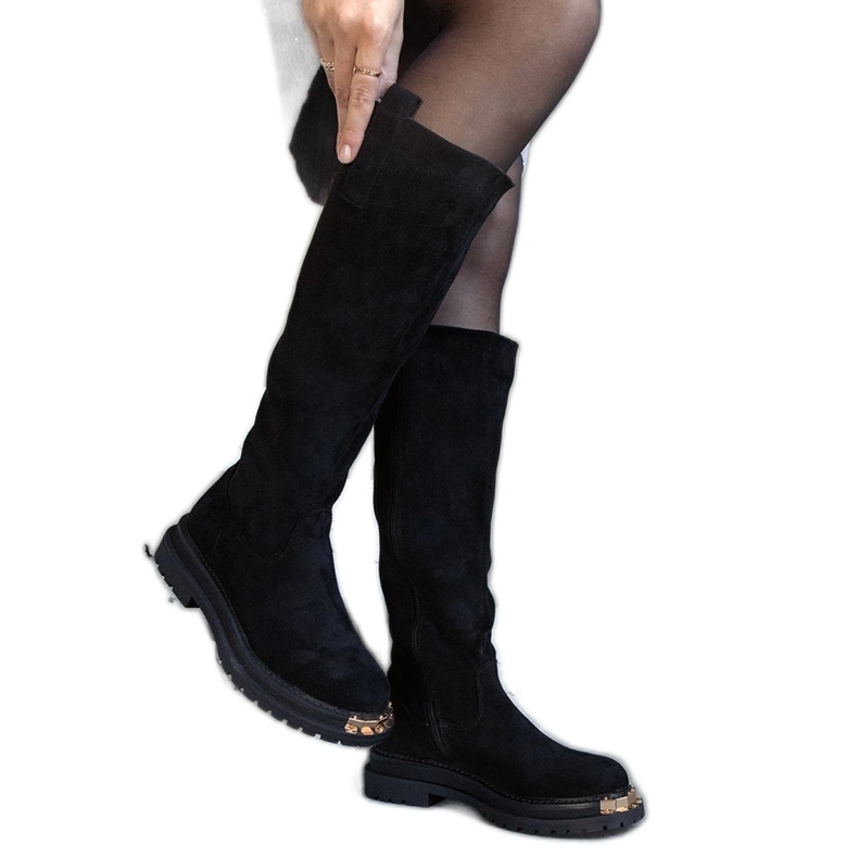 Black boots with metal finish by Guillora