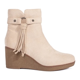 Suede light beige women's wedge boots with fringes