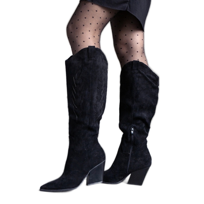 Black insulated cowboy boots by Arsenio