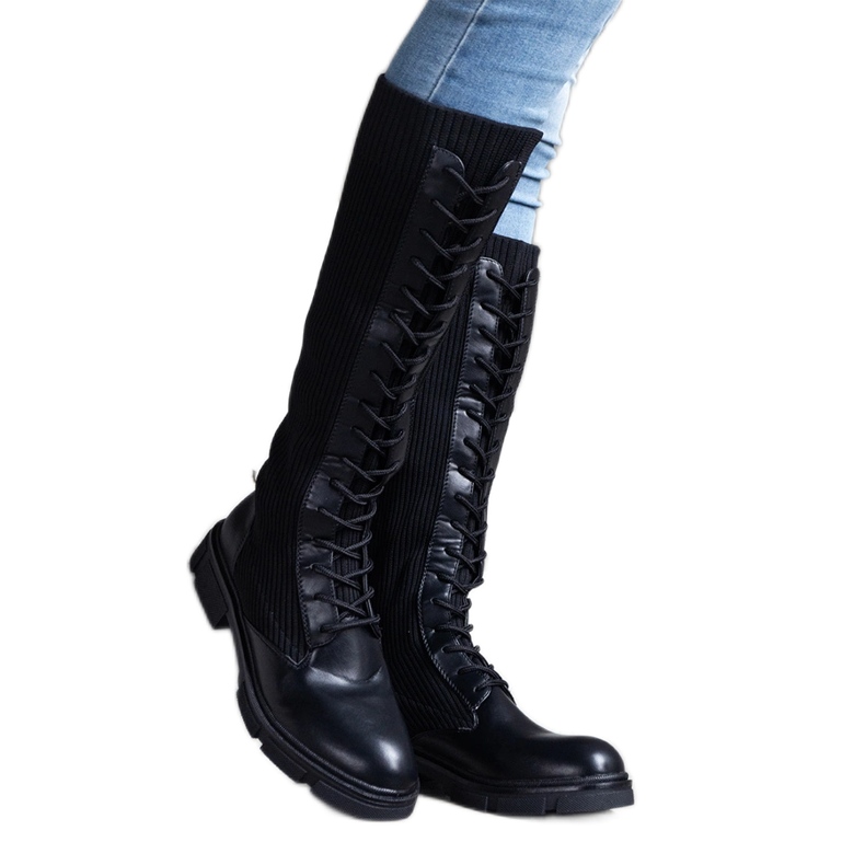 Black slip-on boots with a flexible upper from Veradi