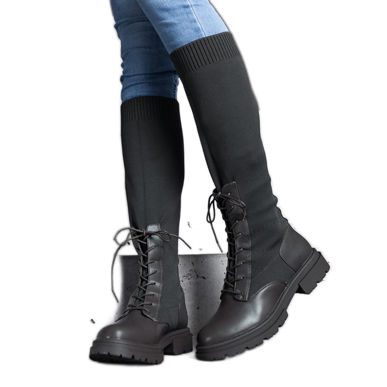 Green slip-on boots with a flexible material upper by Luana