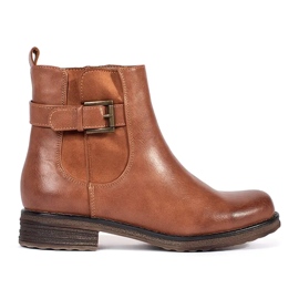 Brown women's ankle boots with a buckle on a low heel