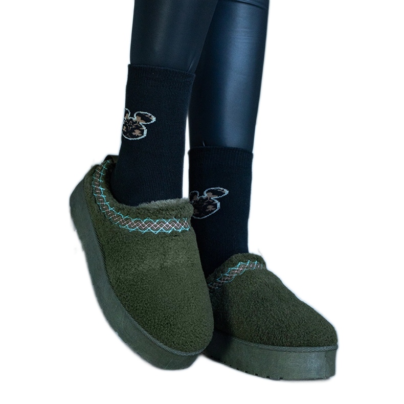 Green platform snow boots with a low upper and an embroidered Greene pattern