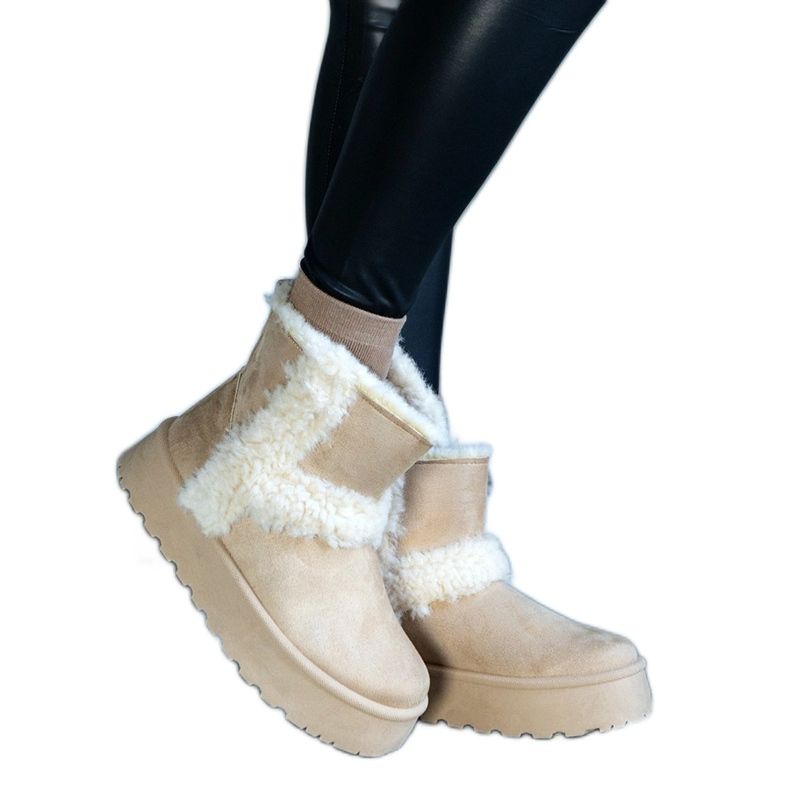 Beige eco-suede platform snow boots decorated with fur from Peters Beige eco-suede platform snow boots decorated with fur from Peters