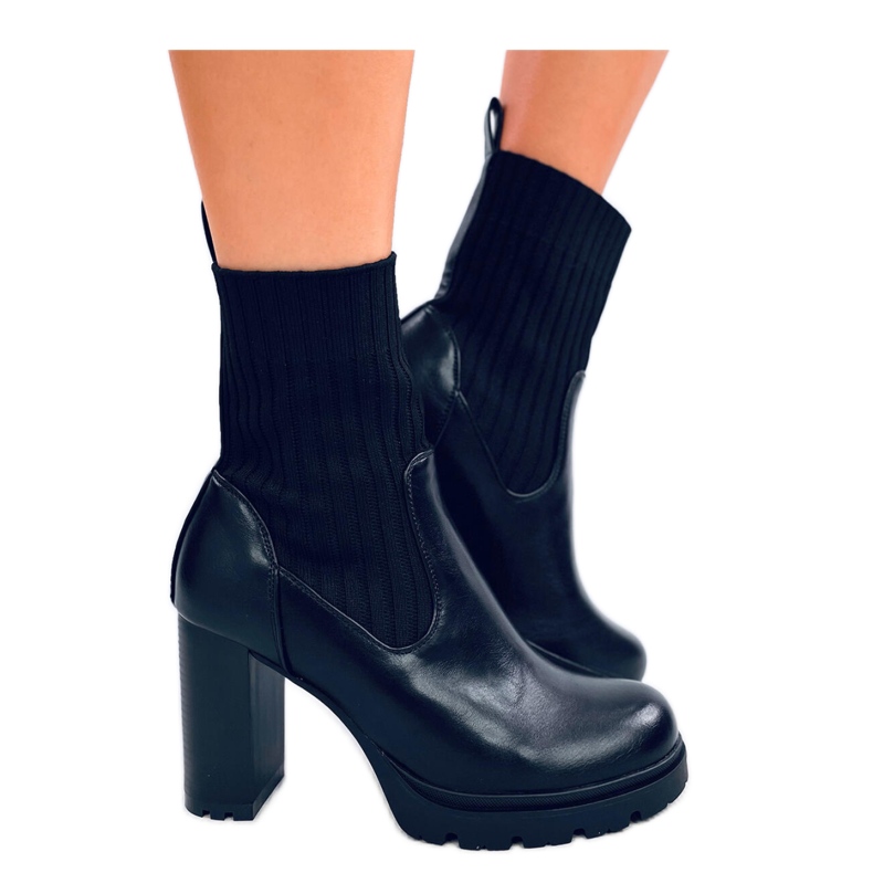 Black high-heeled ankle boots