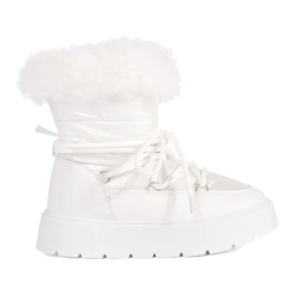 Women's white snow boots with fur on a thick sole