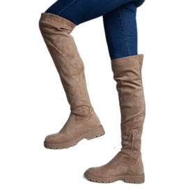 Brown long boots with a flat sole