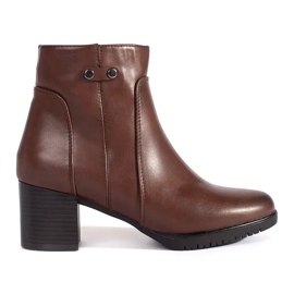 Brown high-heeled ankle boots by Sergio Leone