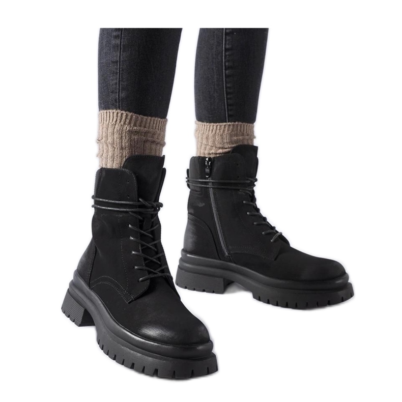 Black boots with a worn toe, Vadnais - Solea