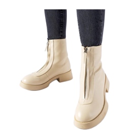 Beige insulated ankle boots with a zipper Beige insulated ankle boots with a zipper