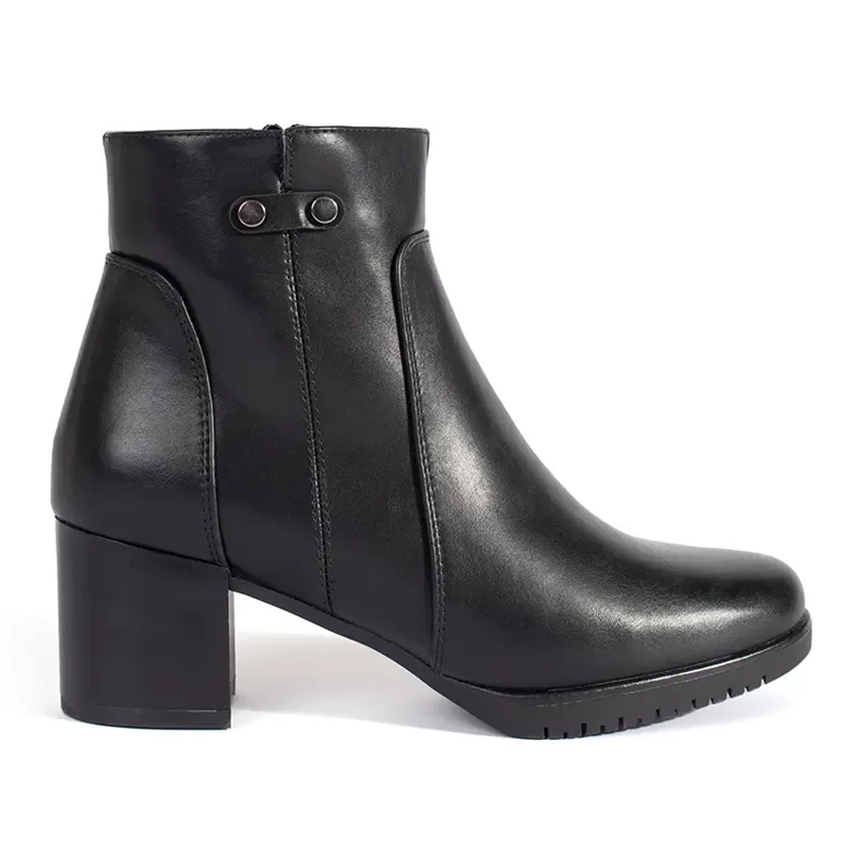 Black high-heeled ankle boots by Sergio Leone