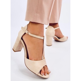 Ferdi Beige high-heeled sandals with gold decoration