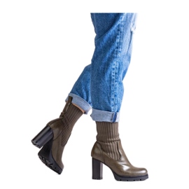 Green ankle boots with a block heel made of eco-leather Green ankle boots with a block heel made of eco-leather