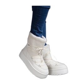 White platform snow boots with fur