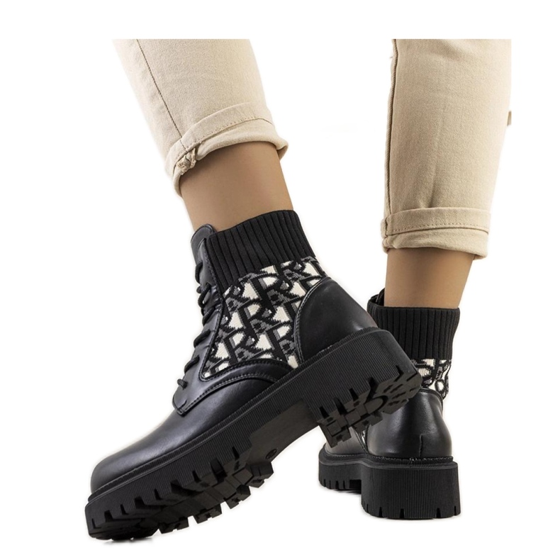 Black boots with a flexible upper