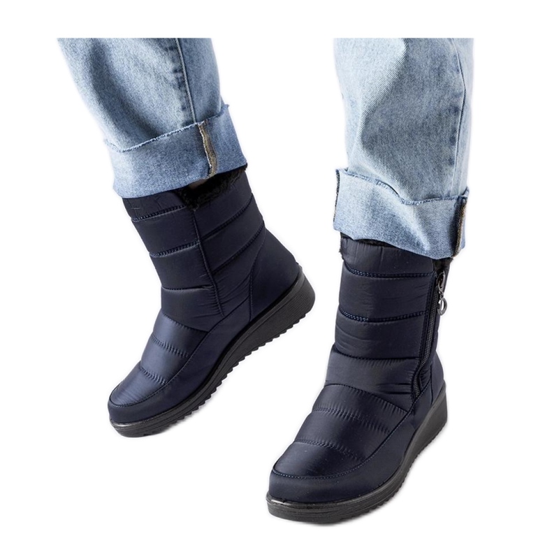 Navy blue snow boots with a low wedge