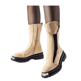 Beige insulated ankle boots with a decorative toe