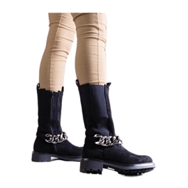 Black women's ankle boots decorated with chain