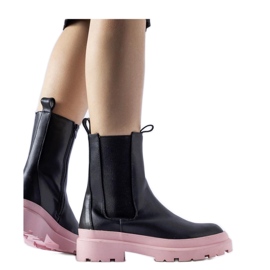 Black boots with pink soles