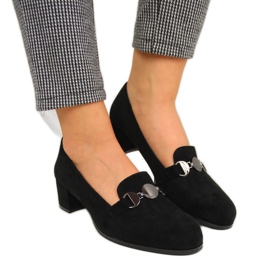 Women's black shoes with a block by Sergio Leone