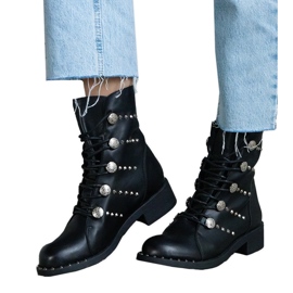 Black lace-up ankle boots decorated with studs