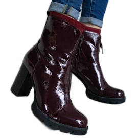 Burgundy patent ankle boots decorated with a clasp red Burgundy patent ankle boots decorated with a clasp red