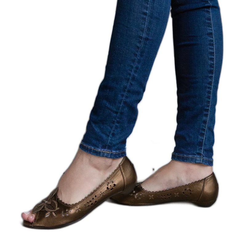 Brown openwork ballet flats with an open toe