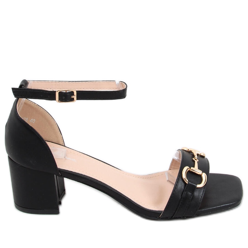 Black high -heeled sandals with a golden decoration Black high -heeled sandals with a golden decoration