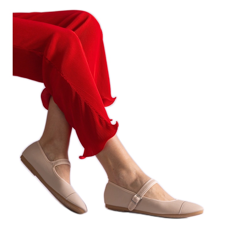 Beige ballet flats with a matte finish, fastened with a buckle