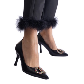 Black high heels decorated with colorful zircons