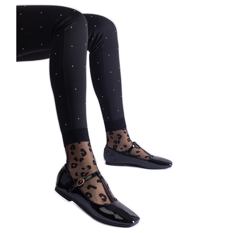 Black patent ballet flats with a belt