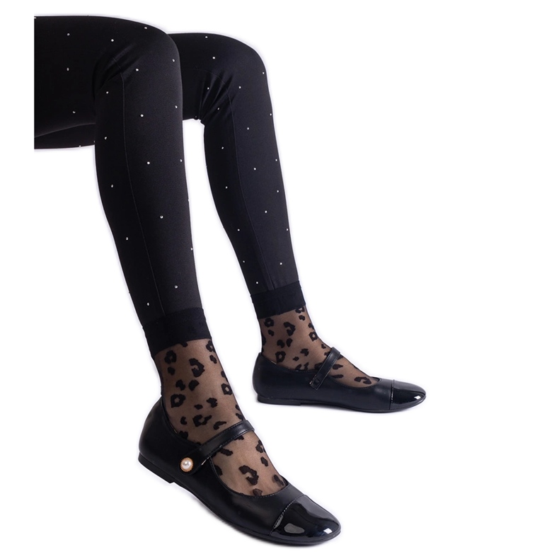 Black ballet flats with a patent toe, fastened with Velcro