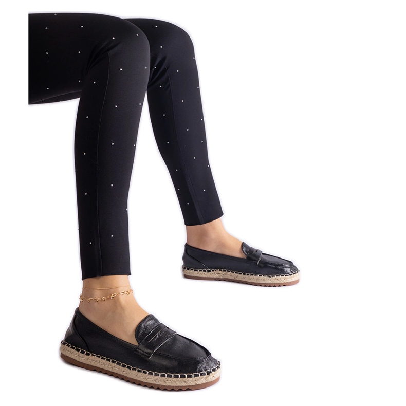 Black sliding espadrilles on the platform