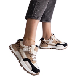 Beige sneakers decorated with an animal motif