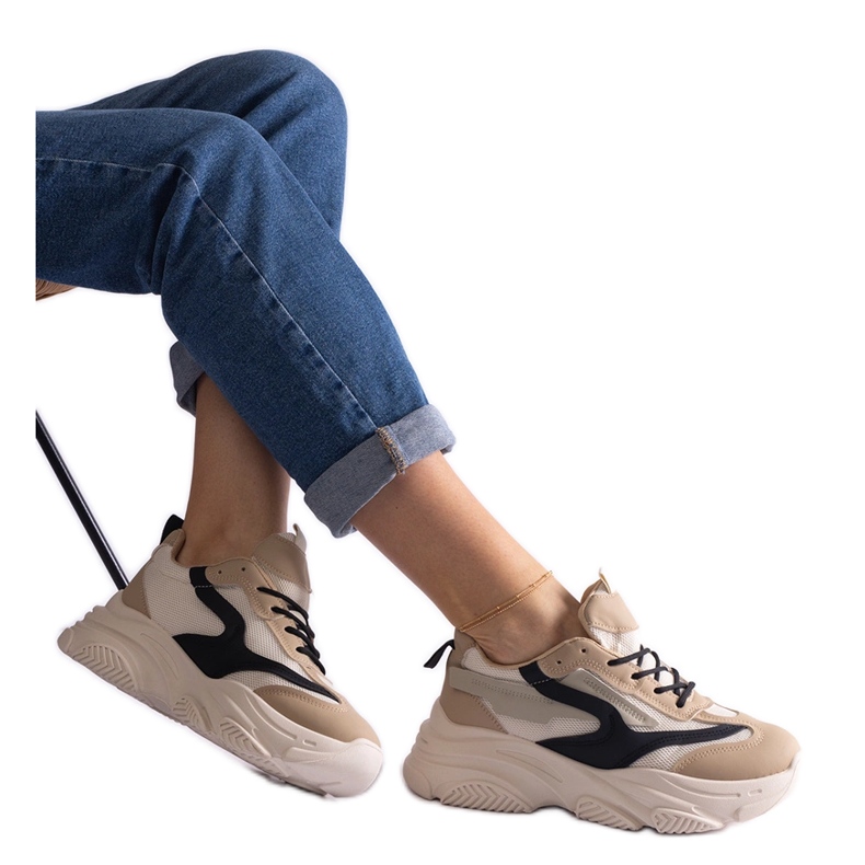 Beige and black women's sneakers