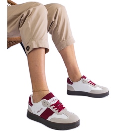 Burgundy sneakers on the platform with stitching white