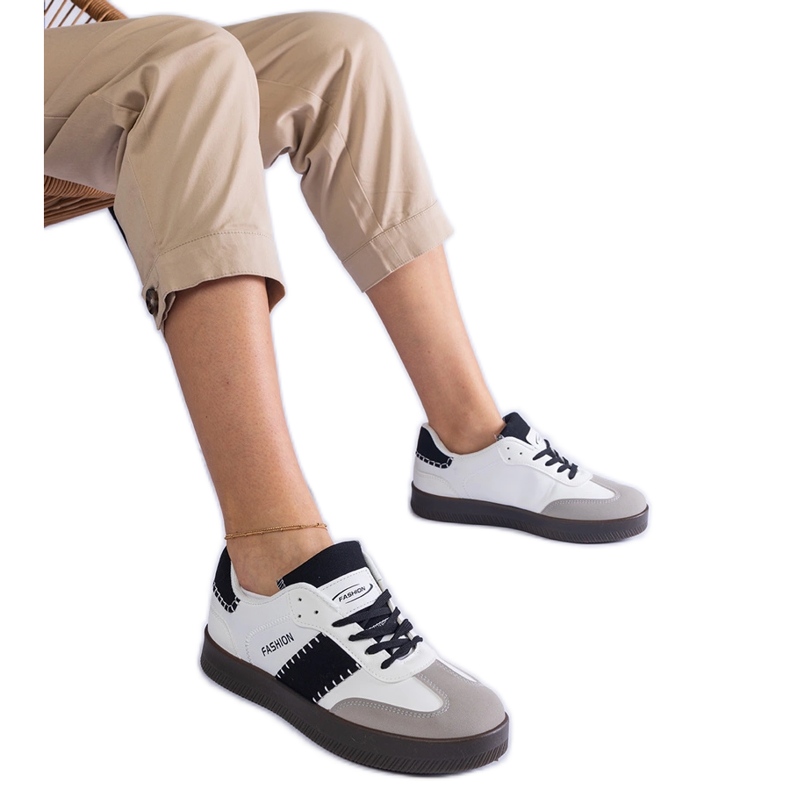 White platform sneakers with stitching