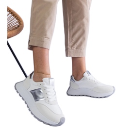 White sneakers on the platform White sneakers on the platform