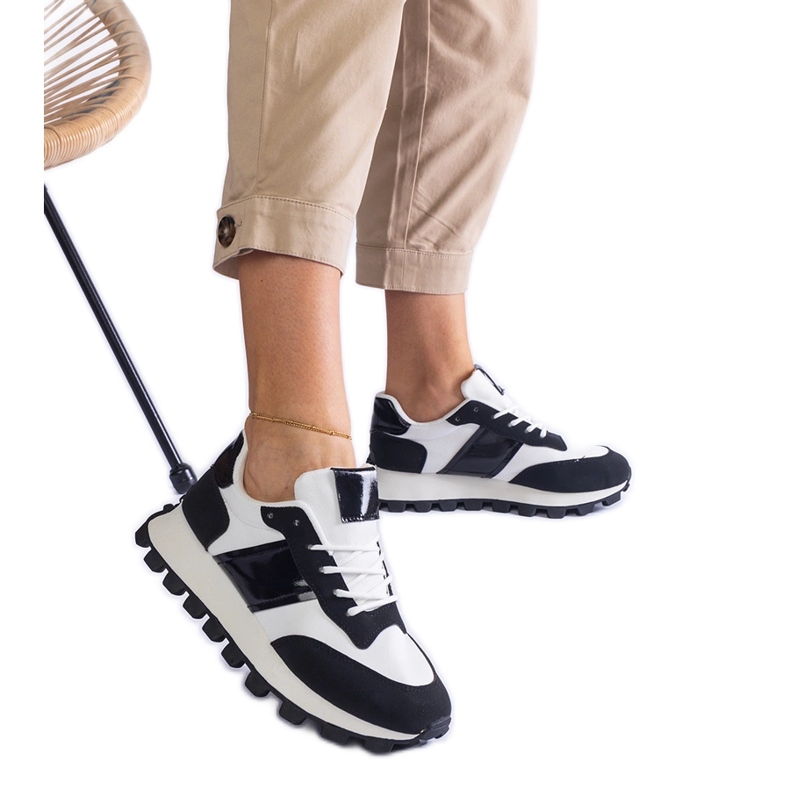 Black sneakers with a visible protector