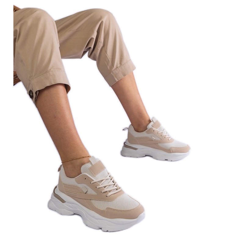 Beige sneakers with a thick sole Beige sneakers with a thick sole