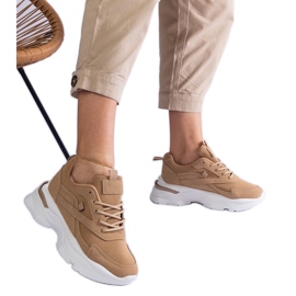 Beige sneakers with a thick sole